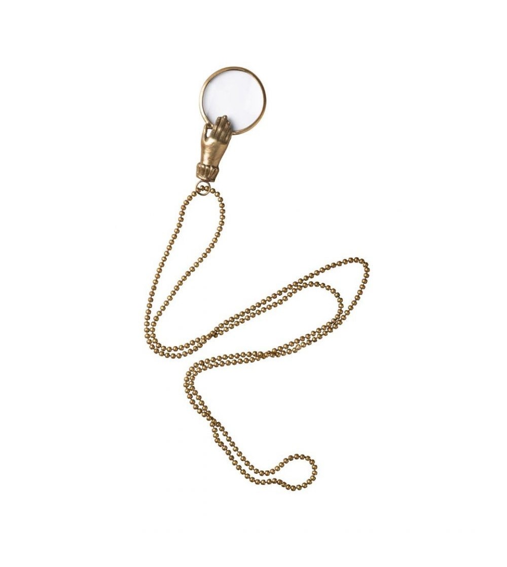Loupe - Petite main tenant loupe